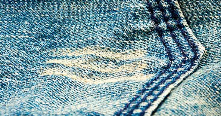 Close-up de costura em tecido denim